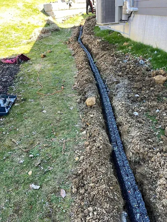 HydroBlox yard drainage installation in Rochester NY by WNY Dirt